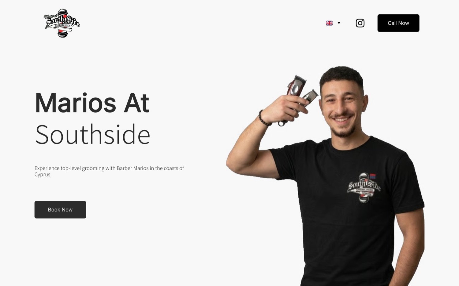 The Marios at Southside site on desktop, the barber holding clippers beside the booking call to action